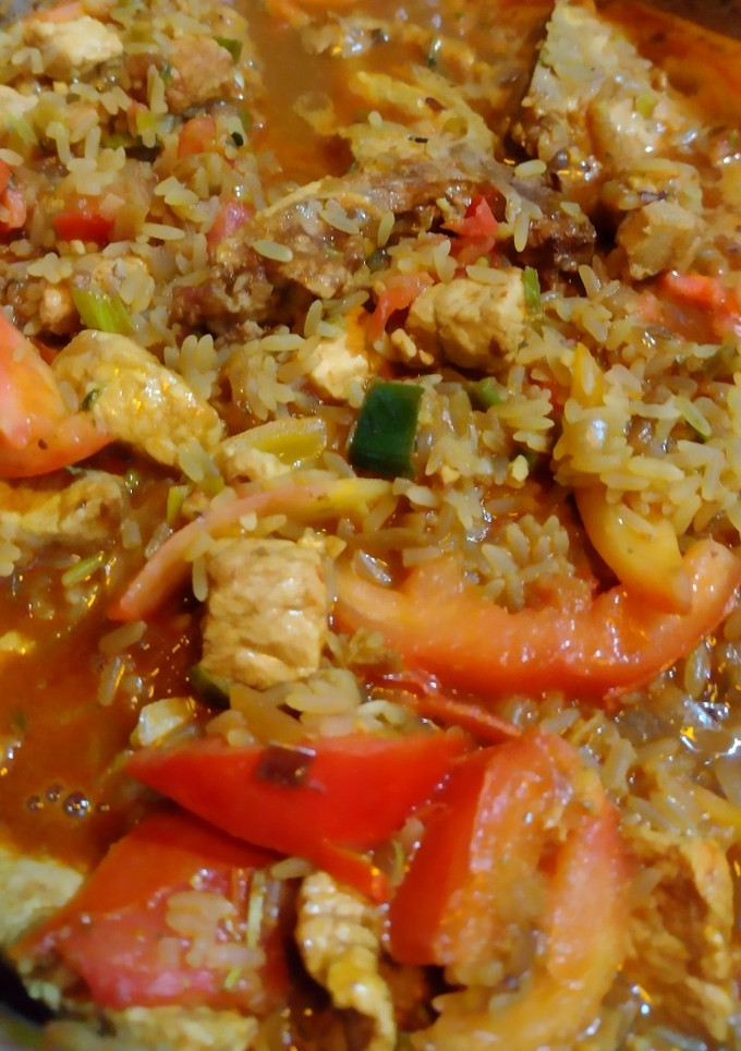 Una foto de Costeletas (chuletas) de cerdo con arroz exquisito