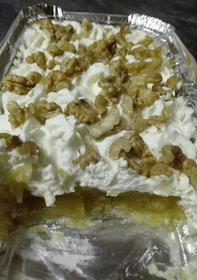 Una foto de Manzana con nata y nueces