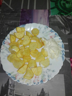 Una foto de Patatas con alioli
