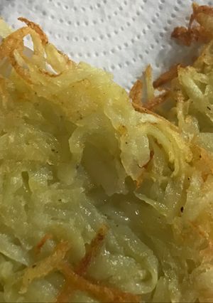 Una foto de Hash Browns - papa rallada