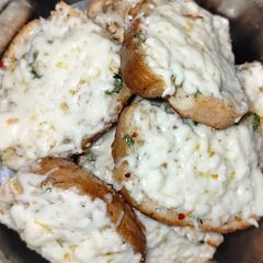 A picture of Cheese spread garlic bread.