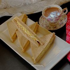 A picture of Egg Mayonnaise Sandwich with Darjeeling Tea.