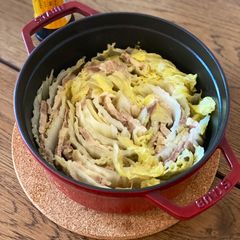 A picture of Japanese mille feuille hot pot with pork belly and napa cabbage.