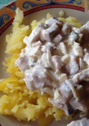A picture of Matjes Herring Salad (Matjesfilet Hausfrauenart).