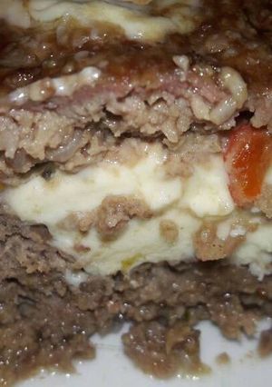 Una foto de Pan de carne relleno con queso