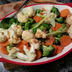 A picture of Steamed Vegetables in Honey vinegrette dressing.