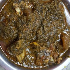 A picture of Nunia saag with mutton.