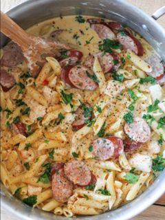 A picture of Cajun chicken and sausage Alfredo.
