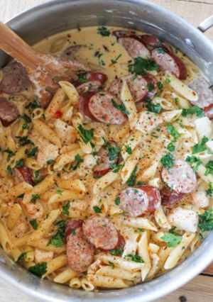 A picture of Cajun chicken and sausage Alfredo.