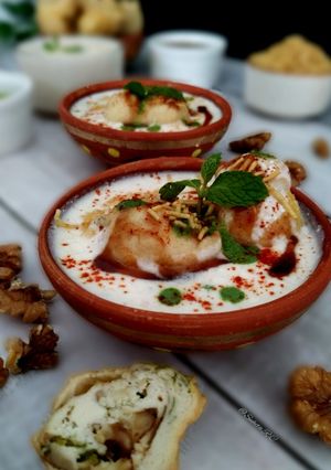 A picture of Walnut paneer stuffed Dahi Vada.