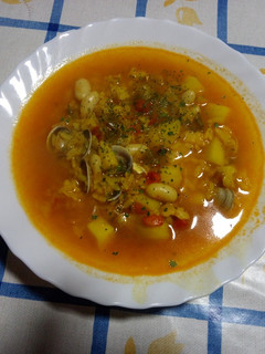 Una foto de Arroz con chirlas y bacalao