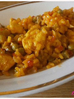 Una foto de Arroz meloso con verduras, champiñones y pollo