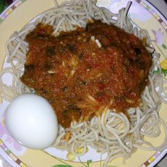 A picture of Spaghetti, egg and stew.
