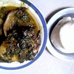Bitterleaf soup with snail and akpu A picture of Bitterleaf soup with snail and akpu.
