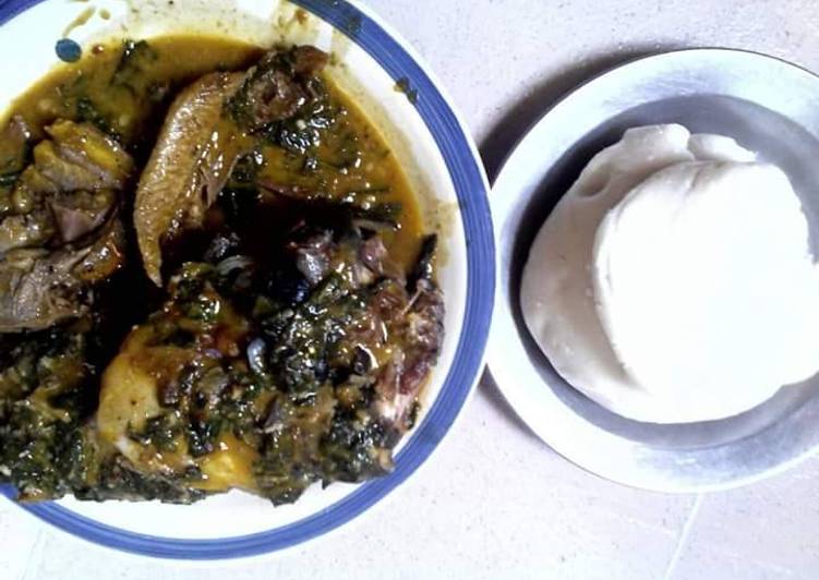 Bitterleaf soup with snail and akpu