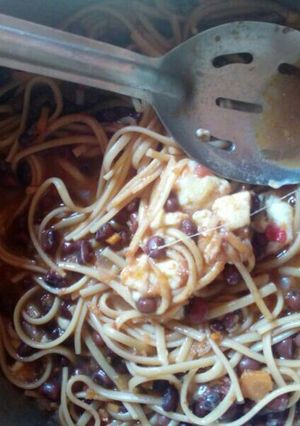 Una foto de Poroto con fideo y queso