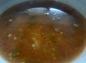 Фото Рассольник с пшеном и солёными огурцами.