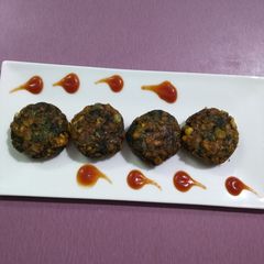 A picture of Spinach,Broccali,paneer tikki.