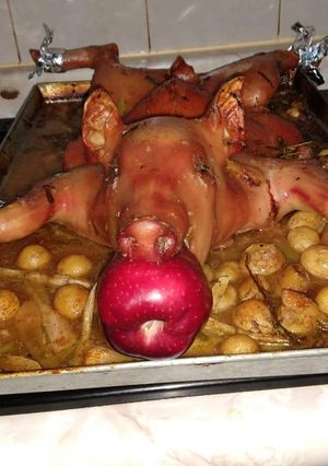 Una foto de Lechón al ajo y especia