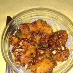 A picture of Crispy prawns with spicy honey and tamarind sauce.