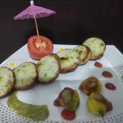 A picture of Onion Semolina stuffed vada.