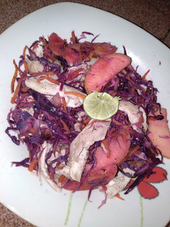 A picture of Red cabbage apple chicken salad.