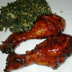 A picture of Sticky chicken drumsticks.