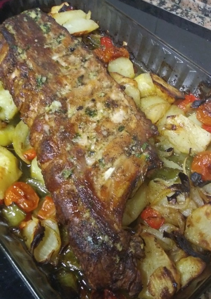 Una foto de Costilla de cerdo al horno con patata panadera