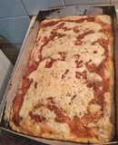 Pizza con doble salsas y orégano