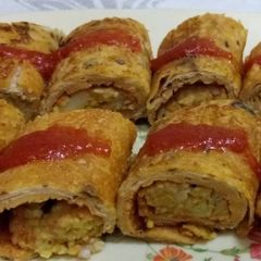 A picture of Stuffed roti chila rolls (leftover roti rolls).