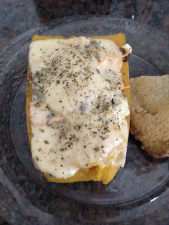 Una foto de Calabaza rellena con milanesa al horno