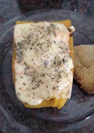 Una foto de Calabaza rellena con milanesa al horno