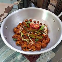 A picture of Boneless Chicken and Tomatoes Karahi.