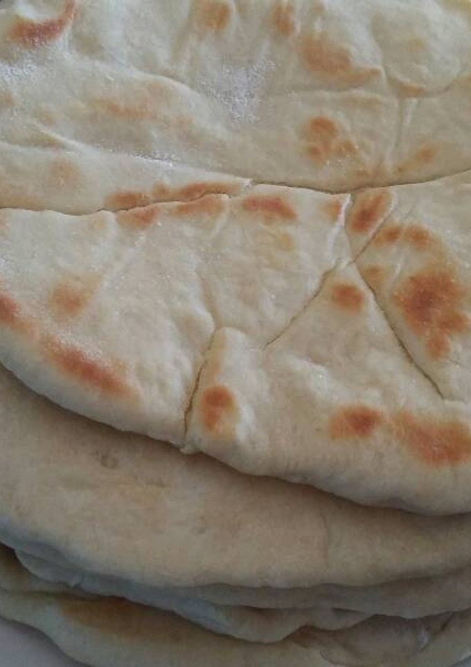Una foto de Mi pan naan solo o relleno con ajo