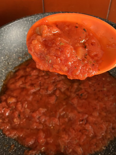 Una foto de Salsita de tomate troceado congelado