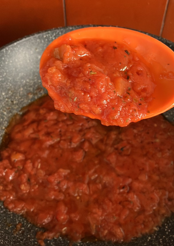 Una foto de Salsita de tomate troceado congelado