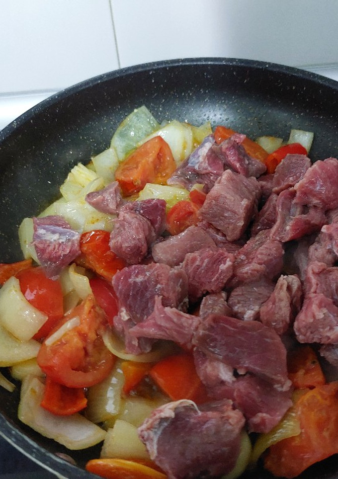 Una foto de Patatas con carne