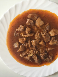 Una foto de Magro de cerdo con tomate