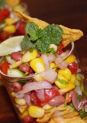 A picture of Nachos Corn and bean Salad.