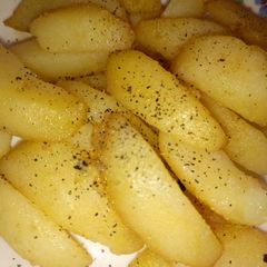 A picture of Potato wedges.