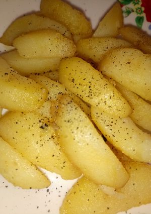 A picture of Potato wedges.