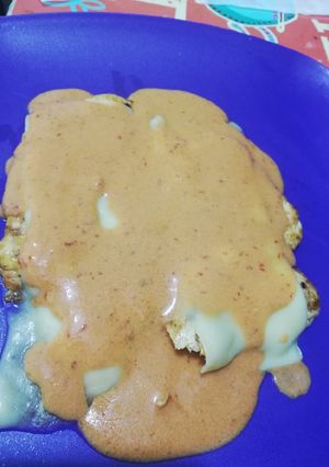 Una foto de Pechugas gratinadas en crema de chipotle