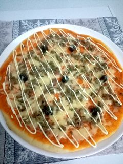 صورة لوصفة بيتزا بعجينة قطنية