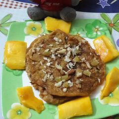 Mango Atta oats pan cake A picture of Mango Atta oats pan cake.