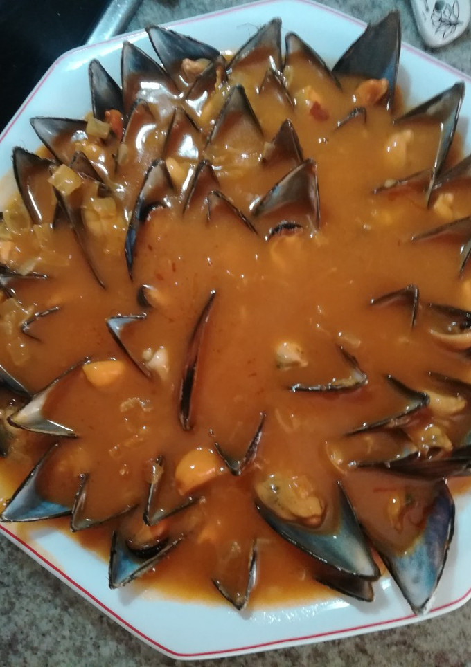 Una foto de Mejillones en salsa