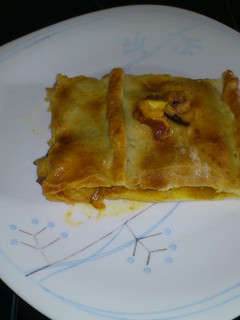 Una foto de Empanada de pulpo y gambas