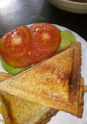 A picture of Polony and cheese sandwich.