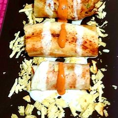 Cheese burst dosa rolls A picture of Cheese burst dosa rolls.