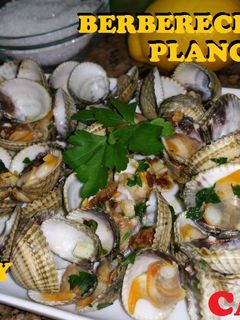 Una foto de Berberechos a la plancha con ajito y perejil