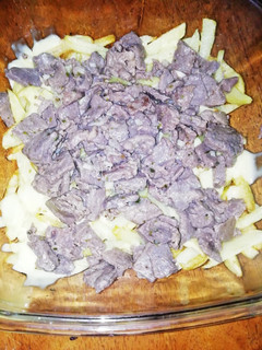 Una foto de Tabla de papas, queso y carne